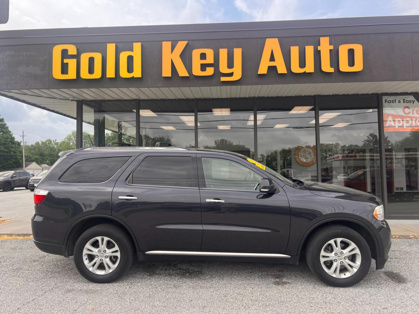 2013 Brilliant Black Crystal Pearl Dodge Durango Crew AWD (1C4RDJDG8DC) with an 3.6L V6 DOHC 24V engine, 5-Speed Automatic transmission, located at 1633 W Kimberly, Davenport, IA, 52806, (563) 323-5341, 41.559456, -90.598732 - Photo#0